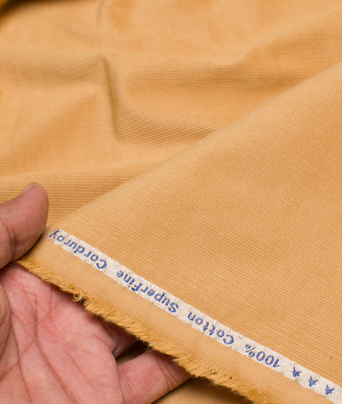 Arvind Cotton Corduroy Striped Shirting Fabric (Pale Orange) Arvind Cotton Corduroy Striped Shirting Fabric (Pale Orange)